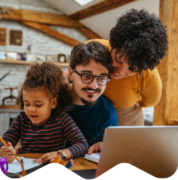 Family with child around a computer