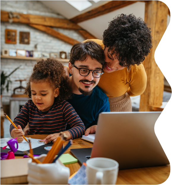 Family with child around a computer